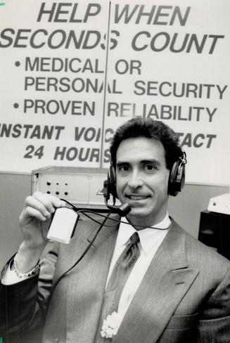 Homelink: Harry Rubinoff shows off the radio transmitter and receiving equipment designed to keep the elderly in touch with emergency services