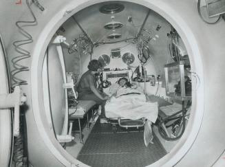 Hyperbaric chamber simulates underwater air-pressure so doctors can treat divers who suffer from the bends -- too rapid decompression. Patients with o(...)