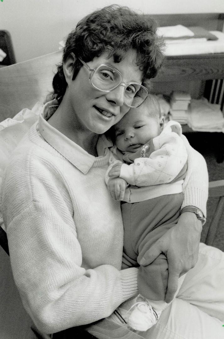 Mom and Son: Mary Simmons of Georgetown with four-week-old son Eric who was born in the Family Birth Centre at Peel Memorial Hospital, part of an alternative way to giving birth