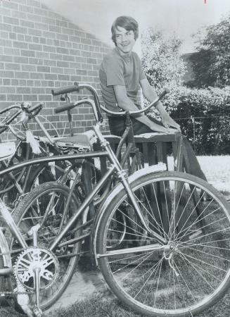 Cerebral Palsy Victim David Gillis, 15, sits on bicycle rack at the Salvation Army's Broadview Village from where his specially made tricycle was stol(...)