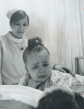 Charlene waits for a Helicopter, In body cast at Hospital for Sick Children, Charlene Hicks, 4, waits for a U