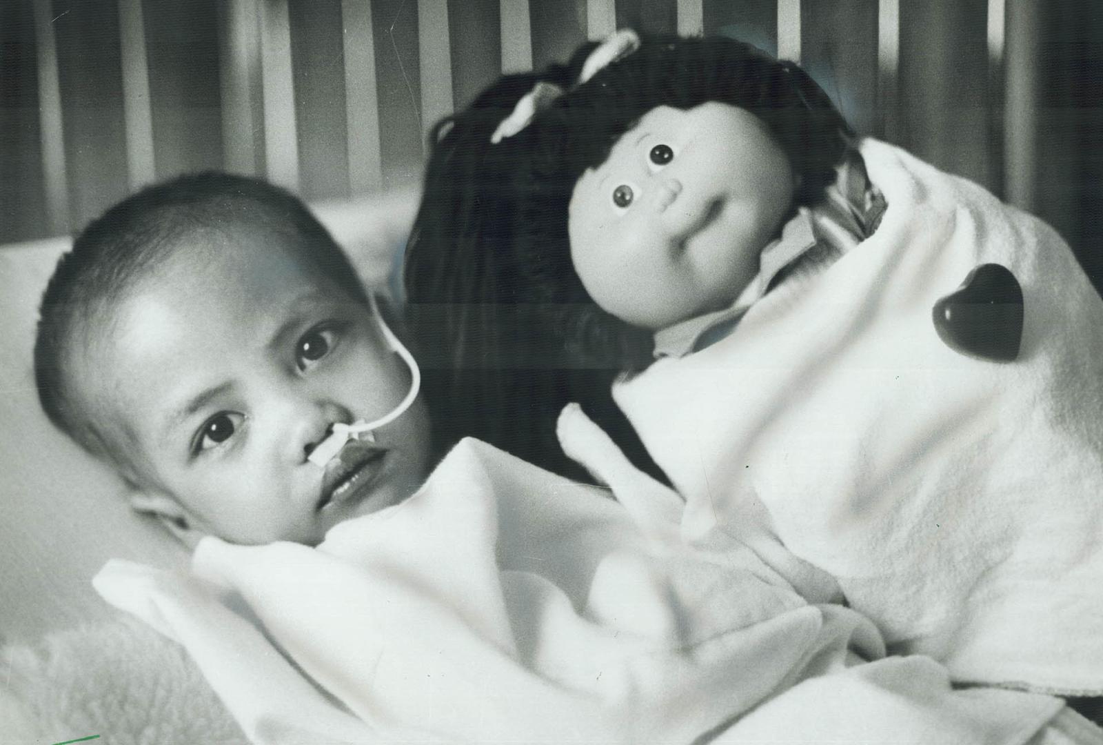 The Herbie Fund helps again, Trieu Ngoc-Ung Pham, 4, from Ho Chi Minh City, Viet Nam, who is suffering from congenital heart disease, rests up for sur(...)