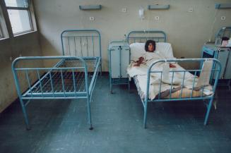 Cholera Peru - Woman in hospital suffering from cholera