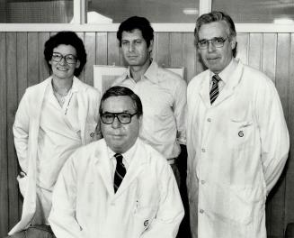 The winning team: Dr. Sally Teasdale, left, Dr. Hartley Garfield, standing, centre, Dr. Ronald Baird, right, and Dr. John Harkins, seated, centre, are(...)
