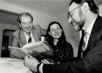 Seeking answers: Soviet doctors Ivan Penishkevich, left, and Leonid Sanduliak confer with pediatrician Luba Komar at the Hosptial for Sick Children