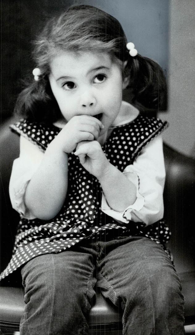 Believed to be only living person born with a cataract in one eye who has developed vision as good in that eye as in normal one, Janine Willie, 4, wai(...)