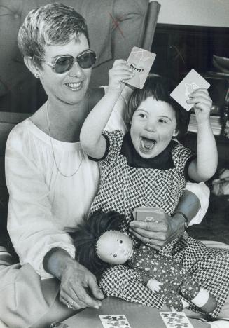 Mum Barbara Maguire uses every moment to help retarded daughter, Margie, 5, learn new skills