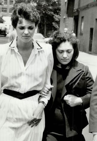 Took stand: Maria Cirillo, right, accompanied by Teresa DaSilva, a family friend, leaves yesterday's session of the inquest into the death of her son, Pino Cirillo, from rare skin disease