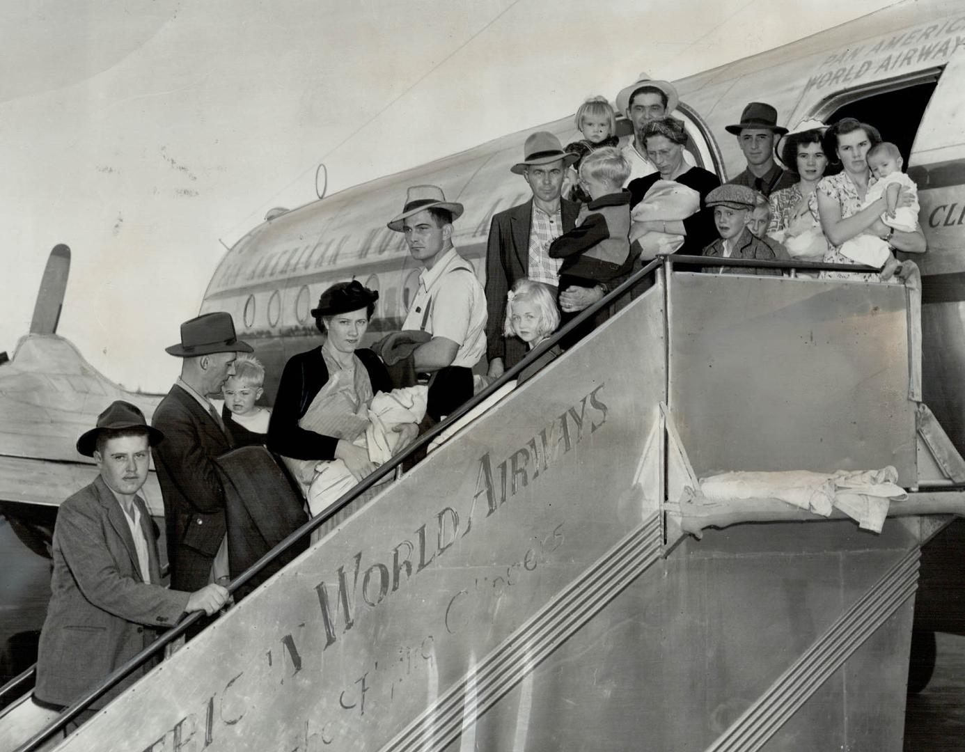 Boarding clipper at Miami, Fla