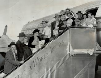 Boarding clipper at Miami, Fla