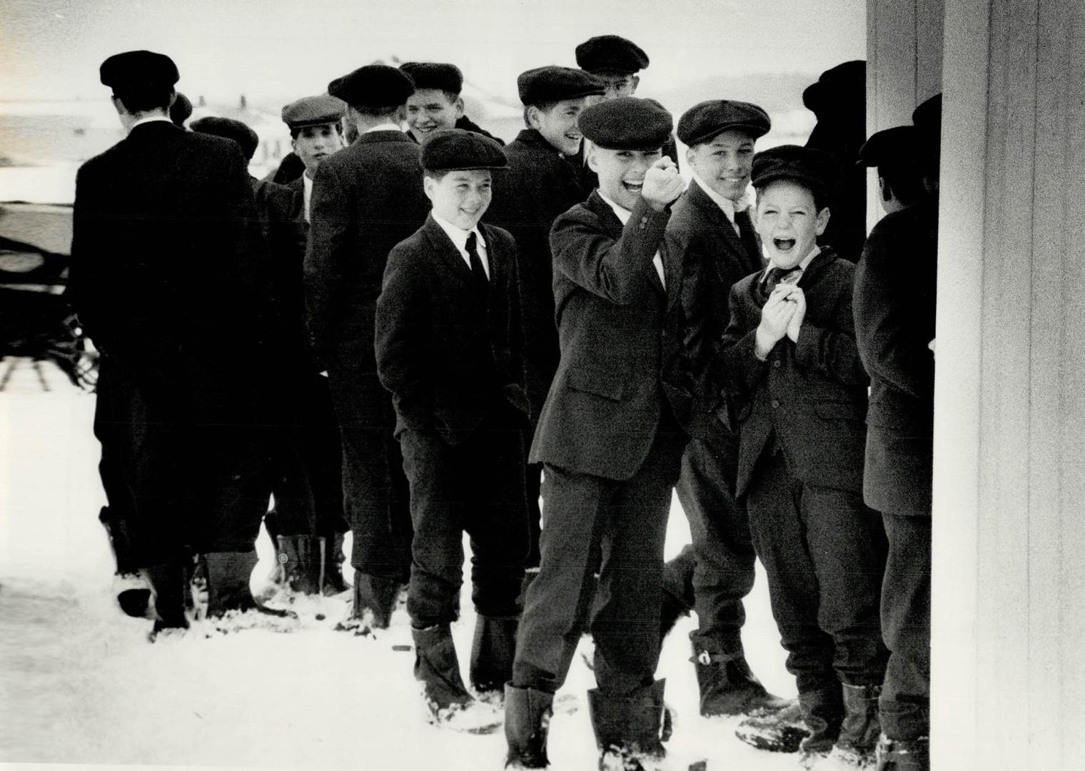 Boys and young men gather after a Sunday service at the Wallenstein meeting house