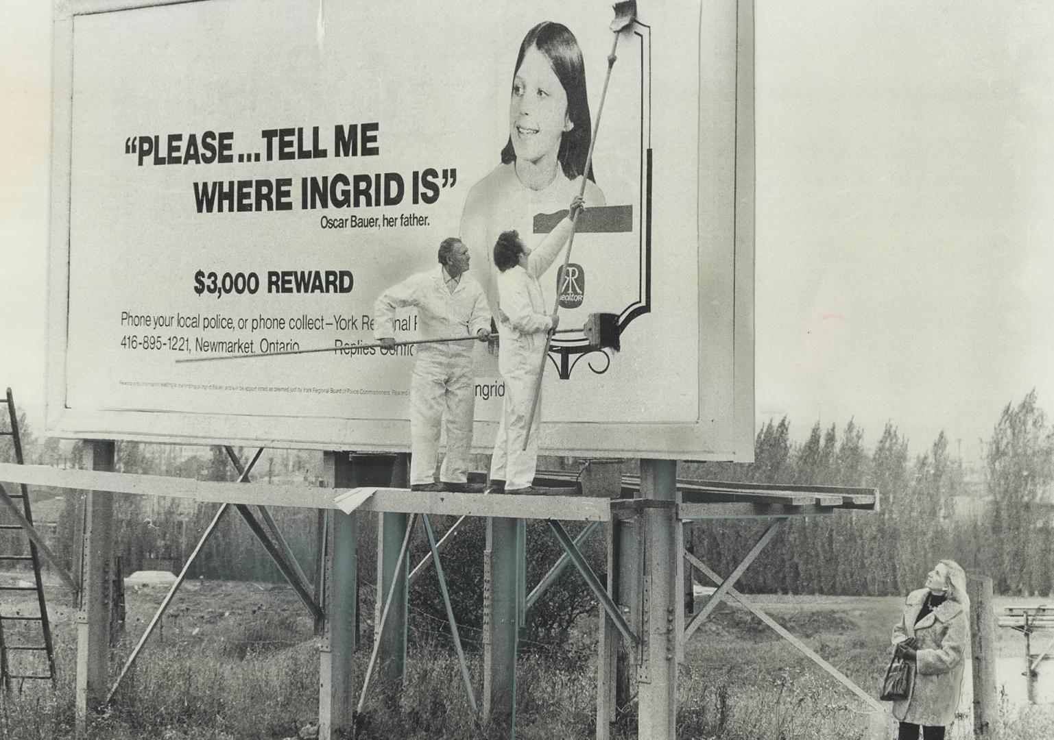 While a mother watches, one of 42 billboard crews across Canada pastes sign seeking 14-year-old Ingrid Bauer, missing from her Kleinburg home since Au(...)