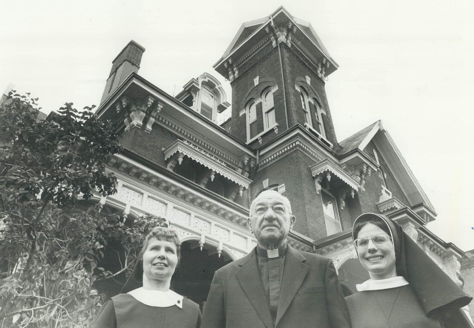 Sisters Alice (left) and Ildephonse with Father Puchniak in front of the Polish Felician Sister's Home
