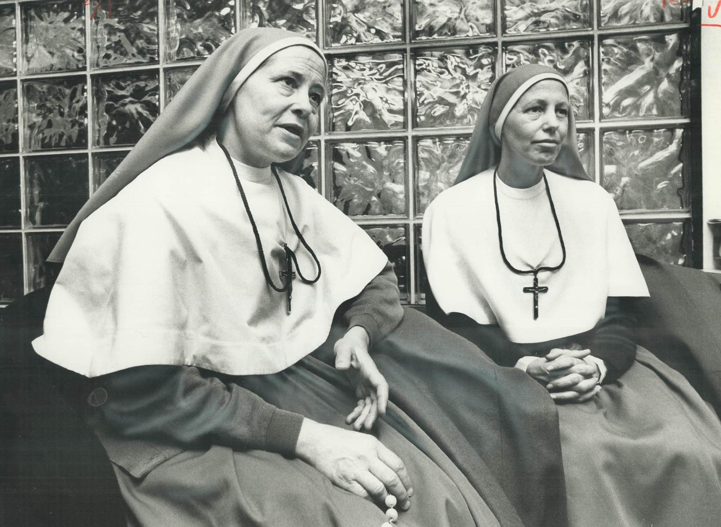 Sister Aimee (right) of The Apostles of Infinite Love, a dissident, Quebec-based religious order, seated with Sister Claire, told The Star six followe(...)
