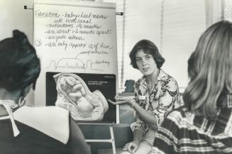 Public health nurse Dora Rust-D'Eye teaches special prenatal class for single mothers