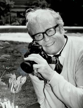 Say Cheese: Christopher O'Brian, a freelance photographer who runs camera clinics for people intimated by complex equipment, says many of them spend too much money in camera stores
