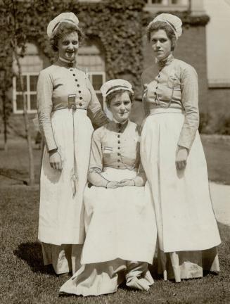 Nurses dress in old-time uniforms, Nurses' uniforms of long ago appeared at the garden party held in the grounds of the Toronto General hospital yeste(...)