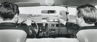 New unit operated by OPP Constables Terry Blace (driver) and Michael Gray detects speeders up to a mile away - coming or going
