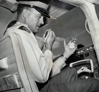 P. C. Ray Gallant on sky patrol, He times speeder, then calls inspector below