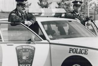 On call: Peel police constables Claude Gelbard, left, and Keith Gill on the beat