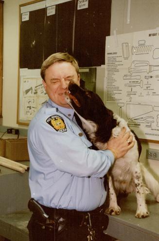 Doggone Partners: That's Buddy, the Peel Regional police force's new drug-sniffing, crime-busting pooch, and handler Mike Bowman