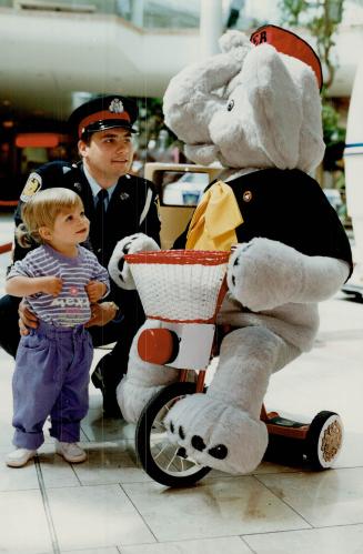 Would you like a ride? Elmer The Safety Elephant, a Peel Regional Police recruit, greets Morgan Chapman, 17 months, and Constable Dave Downer. The $11(...)
