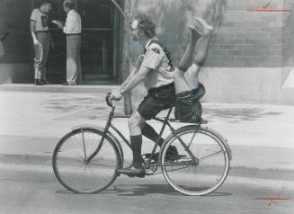 Bicycle built for 1 1/2 This postman ? he wouldn't give his name ? wasn't really delivquin legs for a sculpture and had to take them home on his bike ? turning a few heads in the process