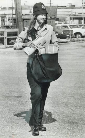 Susette Godin, one of 4 woman letter carriers working out of Postal Station A, enjoys walking and fresh air