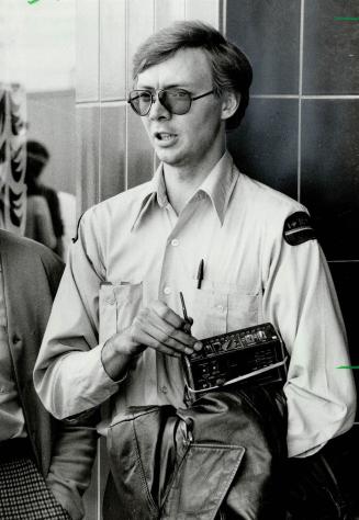 At hold-up scene: Mailman Andy Gayson was forced to stare down the barrel of a hold-up man's pistol as bank was being robbed
