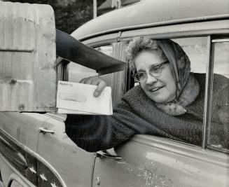 Mrs. Lillian Leigh had her trouble delivering the mail