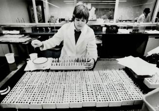 Lab technician Valerie Eggertson, Prepares blood donations for tests