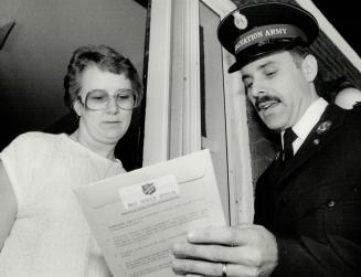 Salvation Army canvassers blitz homes, Captain John Goulding calls on Fronie Samson at her on Millwood Rd
