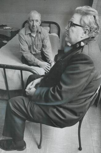 Memories of Christmas past are discussed by Charlie Webb, left, and Major Austin Millar of the Salvation Army at the Harbor Light Centre on Jarvis St.(...)