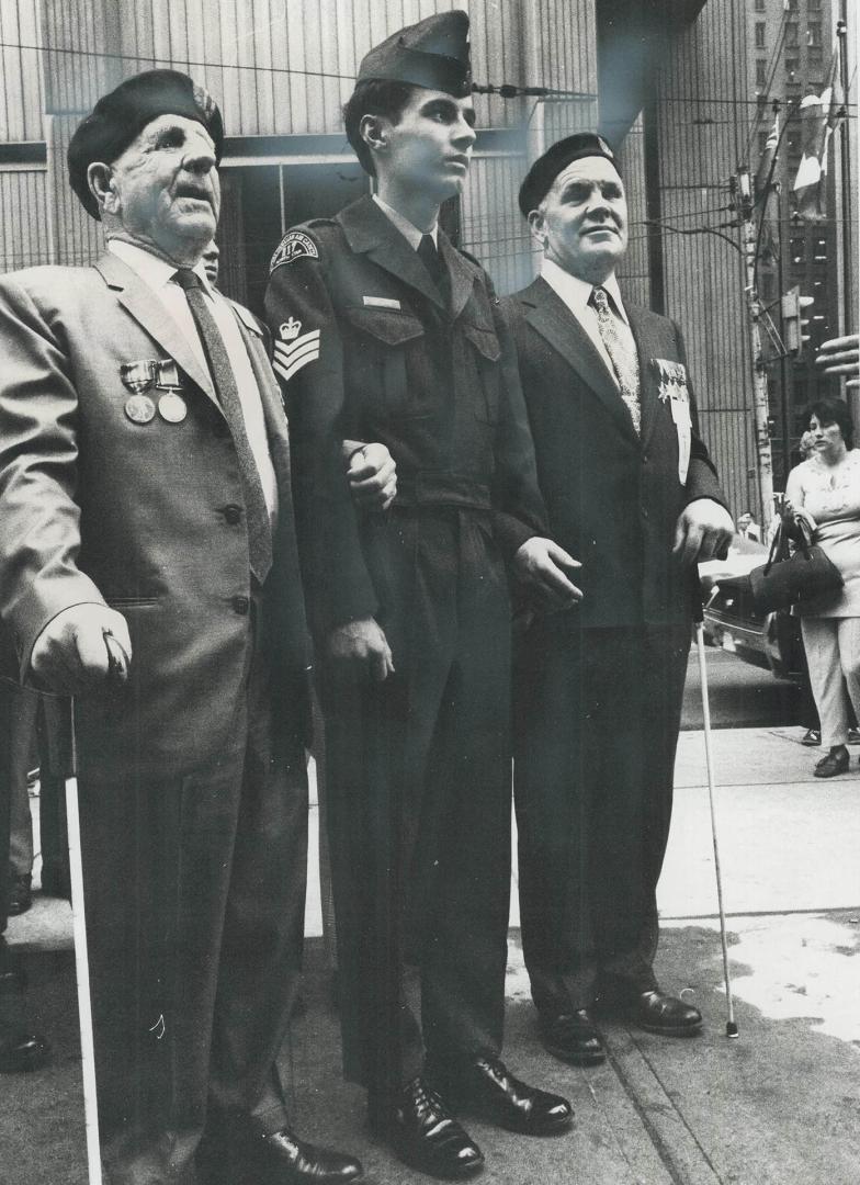 War blinded honor comrades, Blind veterans Charles Hornsby (left) and Ivan White of Victoria march yesterday to the Cenotaph at the old city hall, esc(...)
