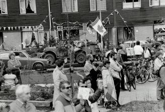 Canadian Flags fly to welcome Canadian vets in Vgchunur, the Netherlands-VE Day parade