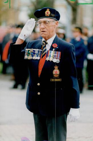 Lest we forget: Ernie Halcrow of the Royal Canadian Legion salutes yesterday at a City of York ceremony