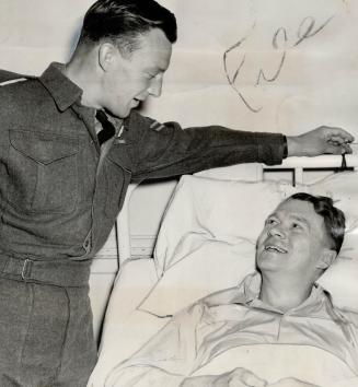 Two Toronto V.C. winners met today at Christie St. hospital. Paratrooper C Toppy Topham, who won his decoration as medical orderly east of the Rhine. (...)