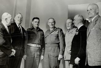 Victoria Cross Winners turned out to greet Field Marshal Viscount Montgomery during his visit to Toronto, Following a luncheon the six shown here had (...)