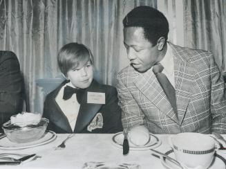 Pursuing subject they share in common are Jeffrey King, this year's Timmy, and Hank Aaron, baseball's home run king, at Sports Celebrities Dinner at R(...)