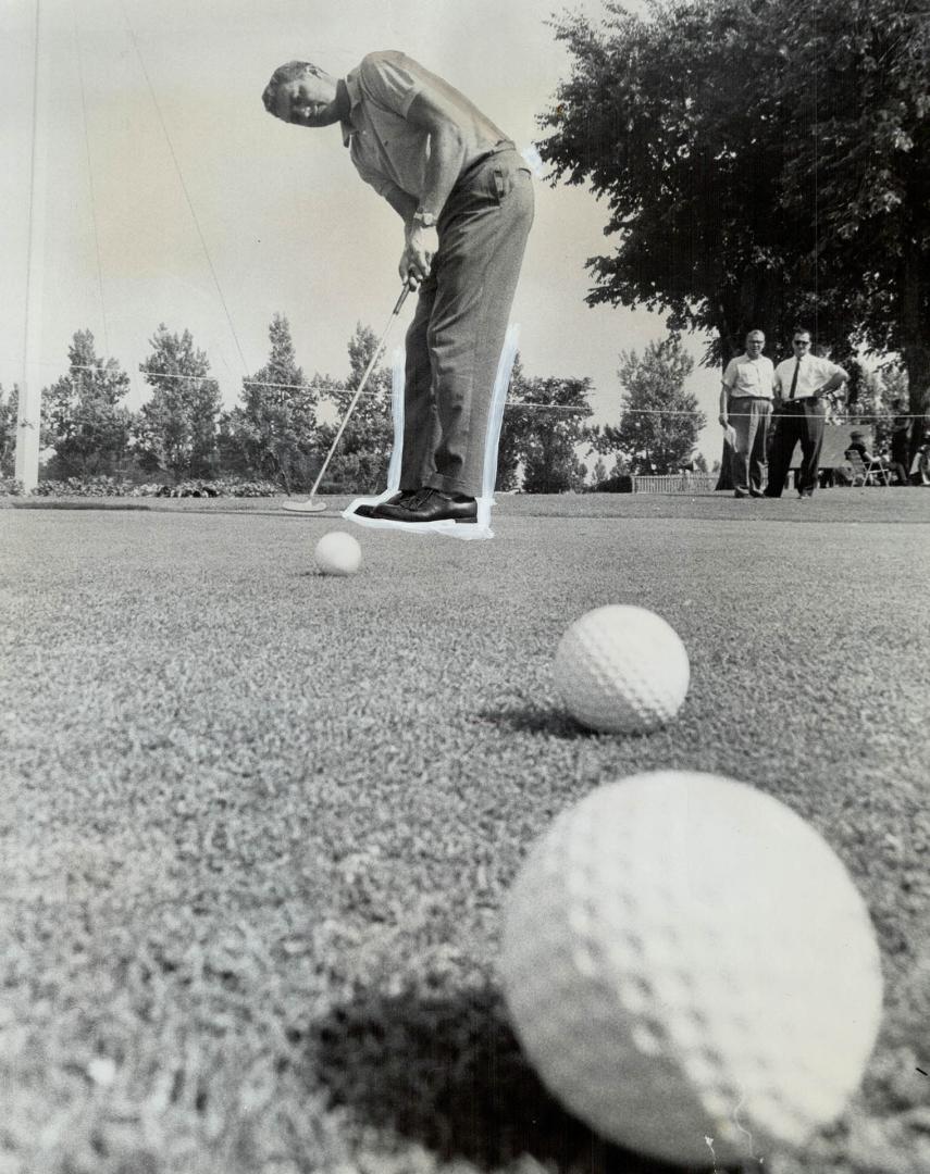 Practice makes perfect, On the principle that putting is the most important part of the game, Tommy Aaron was busy on the green at Scarboro Golf Club yesterday, polishing up for the Canadian Open