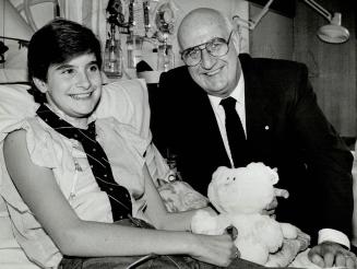 Tie that binds, Stephanie LaForce, 13, of Gananoque, is visited by Lieutenant-Governor John Aird in the Hospital for Sick Children, where she is recov(...)