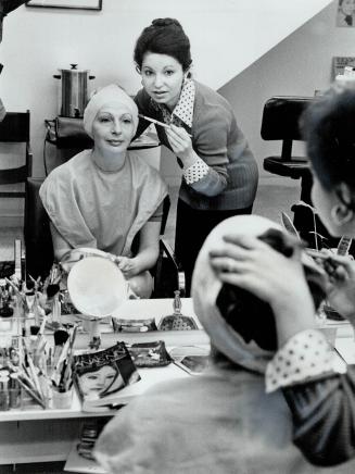 Beauty expert Lily Alexander works with a client in the branch of her mother's company at Davenport Rd