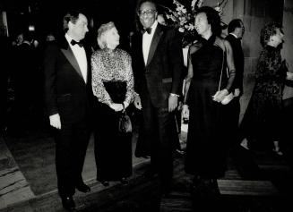 Left, Lieutenant-Governor Lincoln Alexander and his wife Yvonne arrive at the party