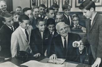 A political curve ball, James Allen, acting Premier and Provincial Treasurer, learns how to throw a curve ball, which should be a political necessity,(...)