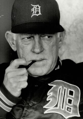 Sparky Anderson enjoys a smoke before last night's crucial game