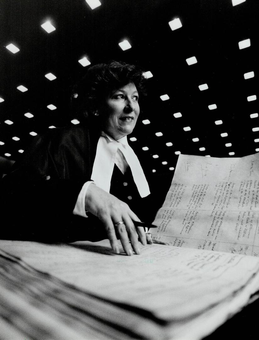 Judge promoted. Madam Justice Louise Arour signs the Judges' Roll at Osgoode Hall after being sworn in as a judge of the Ontario Court of Appeal yeste(...)