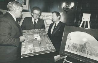 School plans: John Arena, left, shows Small Business Minister David Smith plans for a hospitality school to open in 1986 on the downtown campus of George Brown College