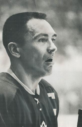 A Dazed George armstrong of the maple leafs on bench