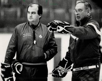 Coach's corner: George Armstrong, right, and assistant coach Garry Lariviere inspect the troops