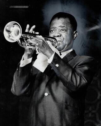 Jazz trumpeter - or, better still, all-round showman - Louis Armstrong opened here last night in Club Embassy's Palm Grove Lounge and proceeded to put(...)